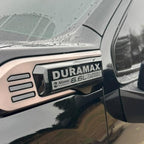 2020-2026 GMC Sierra HD | Black Duramax & Gas Fender Emblem Vent Inserts (Pair) (installed reference photo)